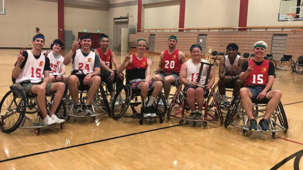 A group of men in wheelchairs playing a sport
