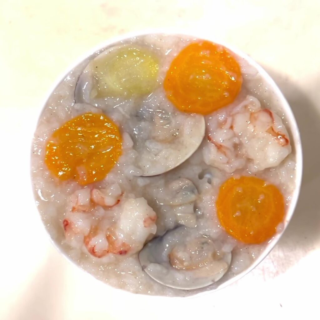 Cooked Shrimp, Clam, and Carrot Rice Porridge